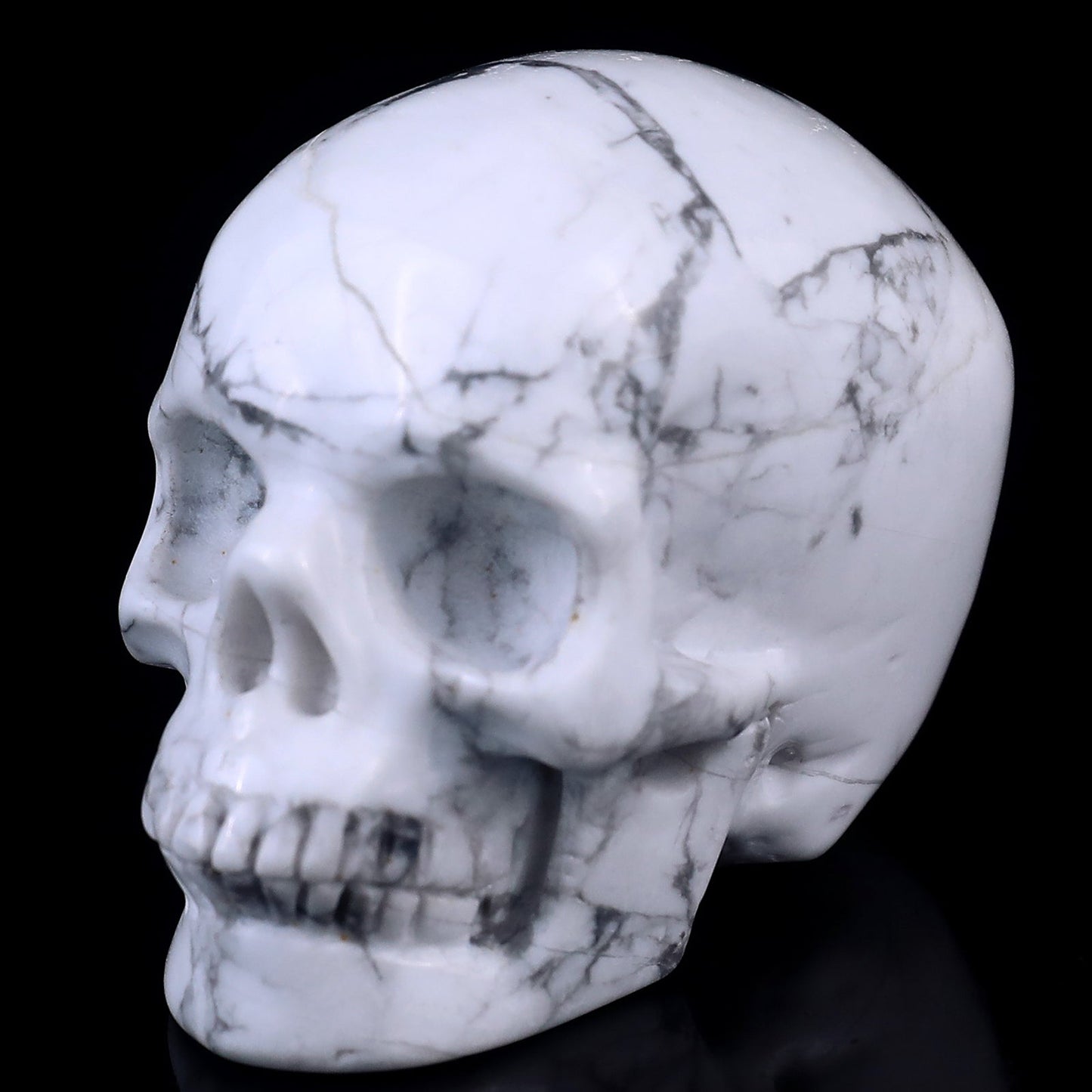 Nicedony 2.2" Howlite Hand Carved Crystal Realistic Skull Sculpture - View 16