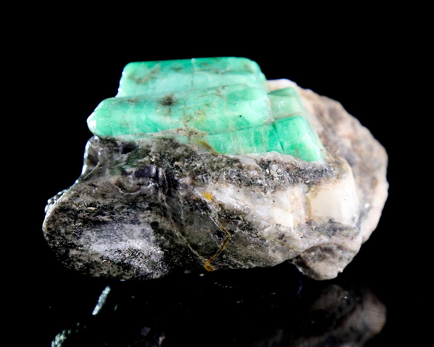 2.6" Natural Emerald Hand Carved Crystal Skull Sculpture