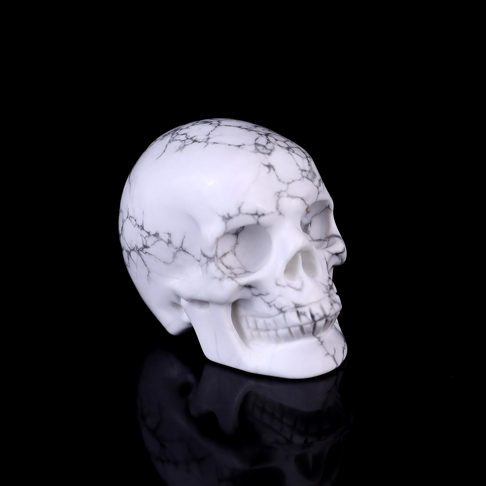 Nicedony 2.2" Howlite Hand Carved Crystal Realistic Skull Sculpture - #2100111
