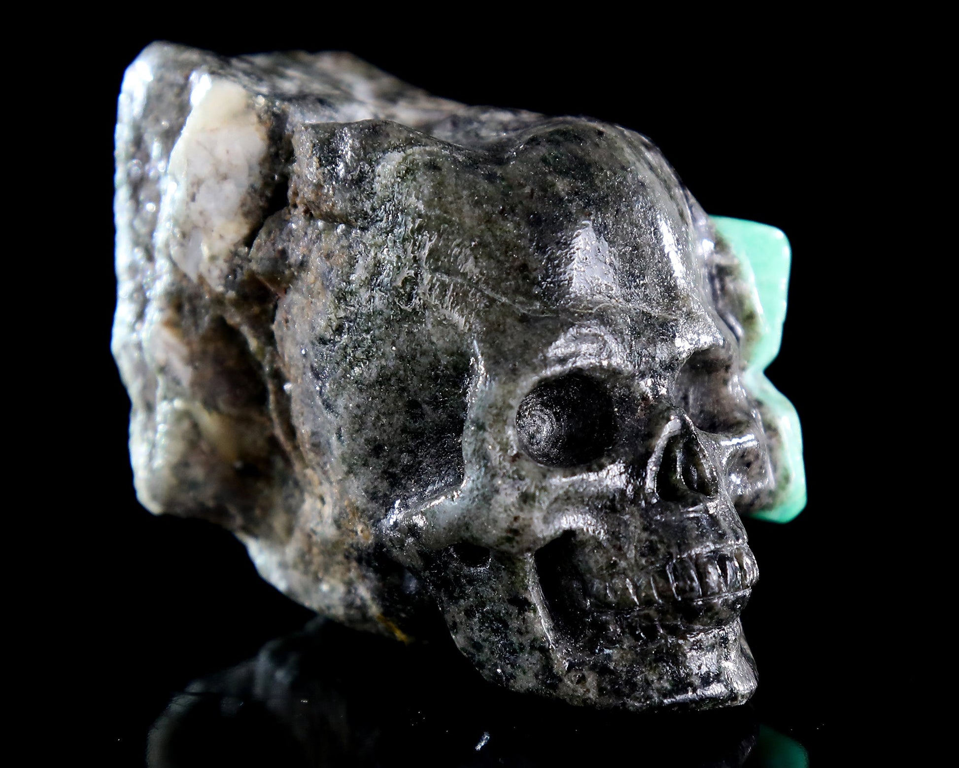 Nicedony 2.6" Natural Emerald Hand Carved Crystal Skull Sculpture - View 8