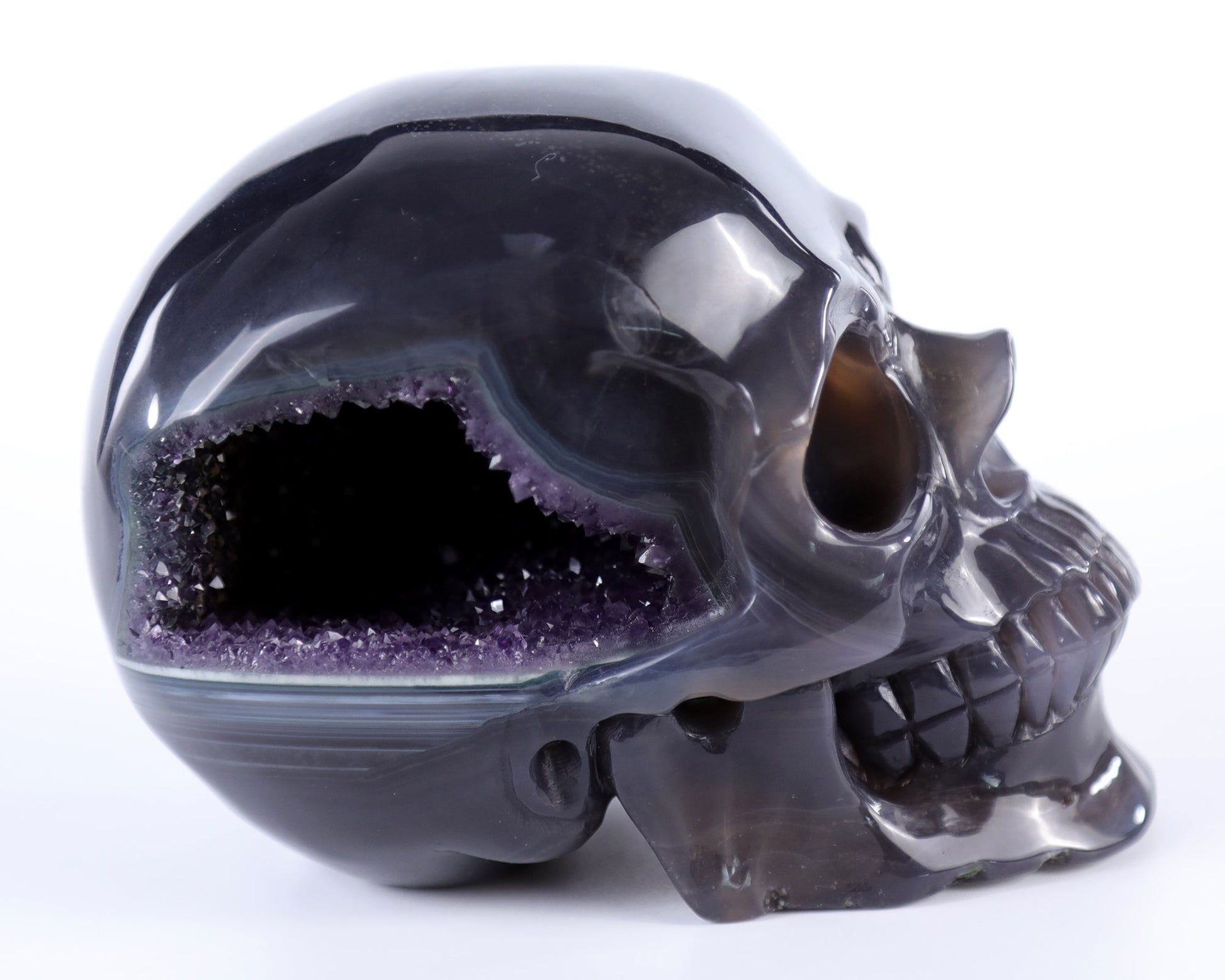 Nicedony 5.7" Amethyst Hand Carved Crystal Geode Skull Sculpture - View 2
