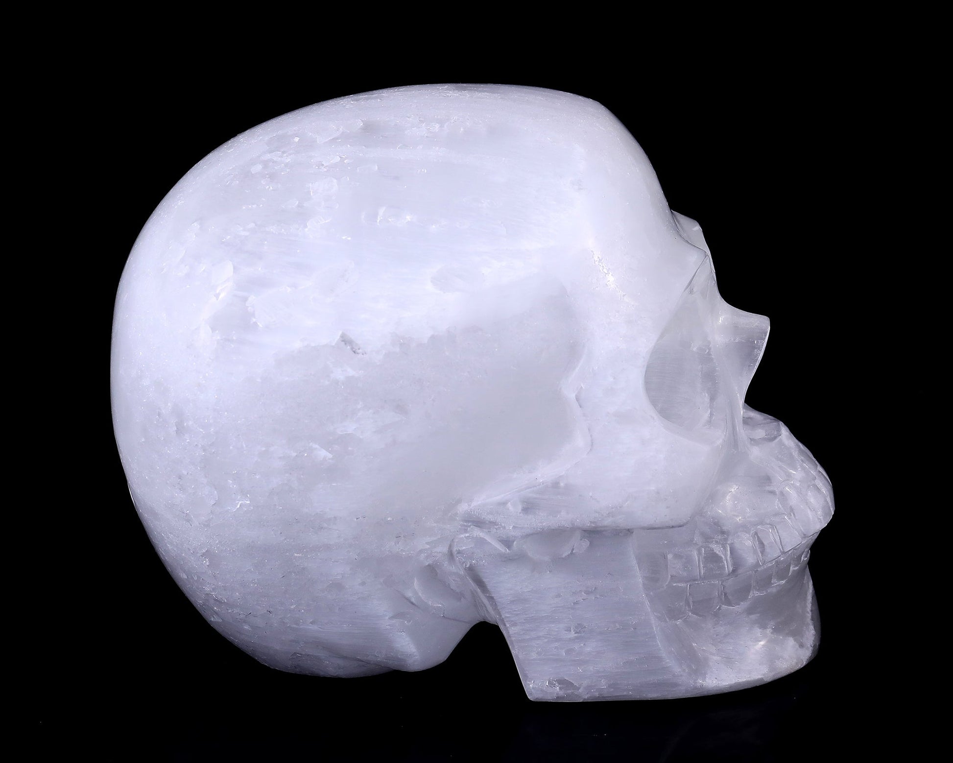 Nicedony 8.3" Selenite Hand Carved Crystal Realistic Skull Sculpture - View 3